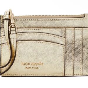 Brand new KATE SPADE metallic gold wristlet card case